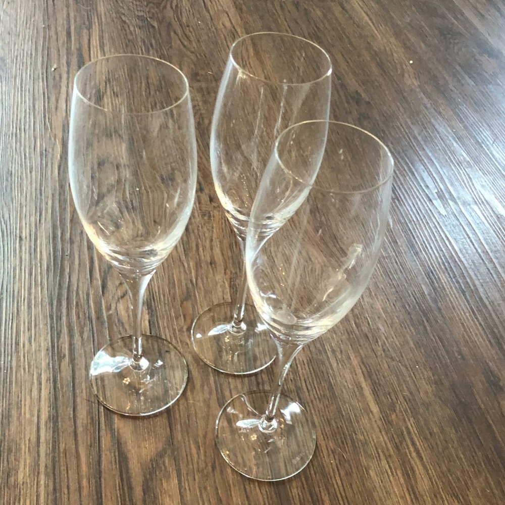 Set of three tall champagne flute glasses